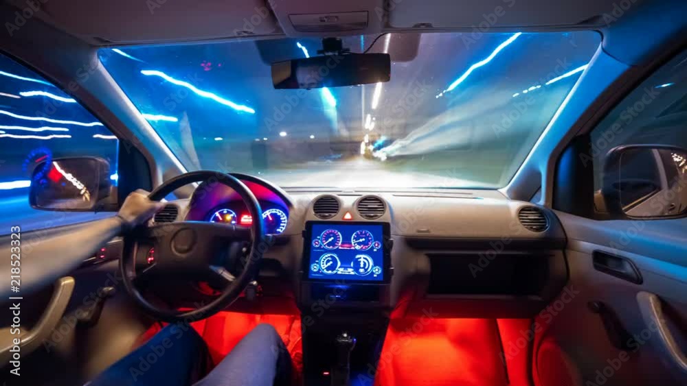 The male driving the vehicle on the night road. Hyperlapse The male driving the vehicle on the night road. Hyperlapse