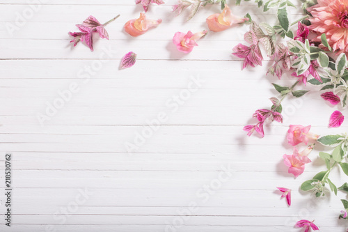 Fototapeta Naklejka Na Ścianę i Meble -  beautiful flowers on white wooden background