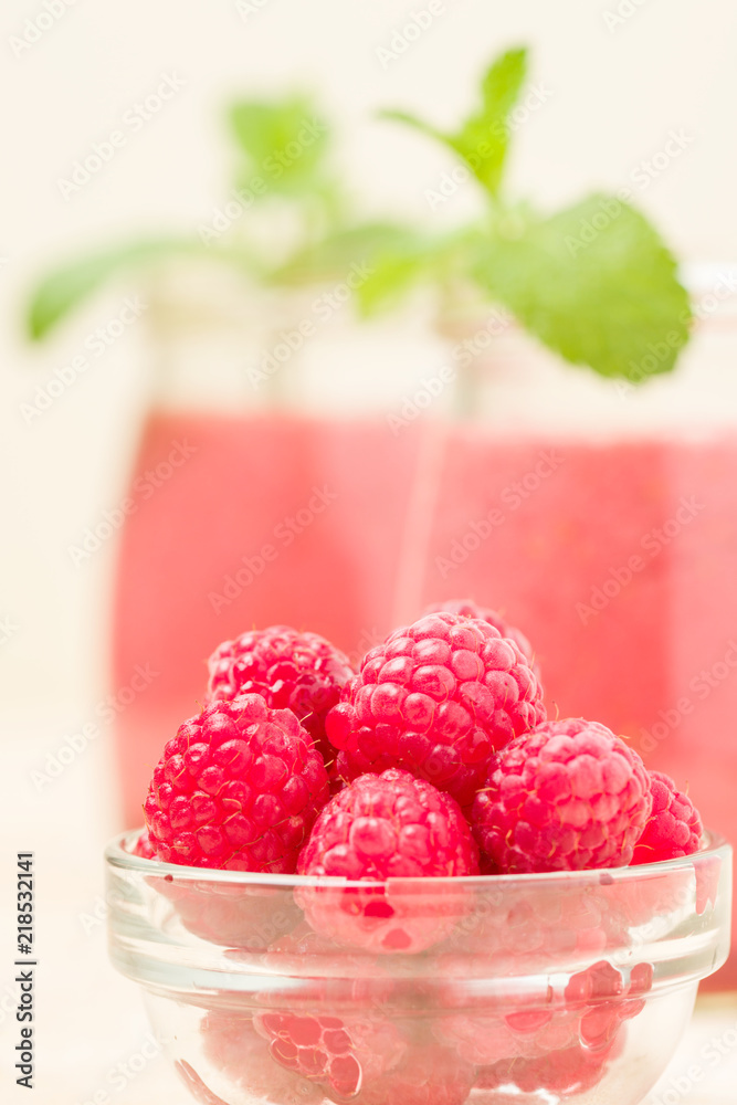 Raspberry smoothie close up photography with fresh summer blended cocktail and ripe berries. Raspberry smoothie close up photography with fresh summer blended cocktail and ripe berries.