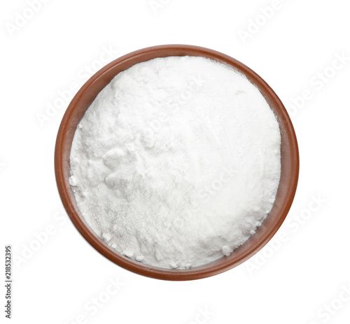 Bowl with baking soda on white background, top view