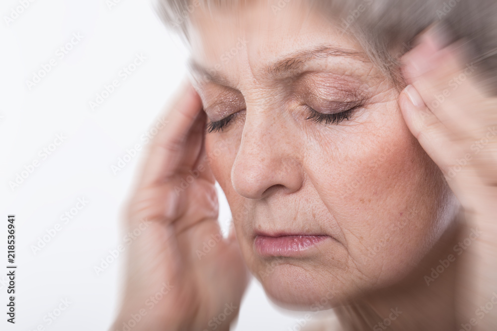 Seniorin woman with gray hair headache pain Seniorin woman with gray hair headache pain