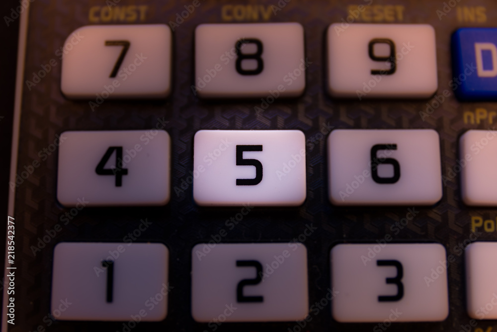 Key number five of the keyboard of a scientific calculator Key number five of the keyboard of a scientific calculator