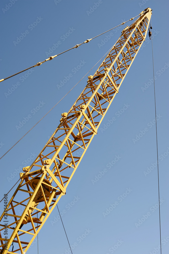 Mobile crane jib with blue sky