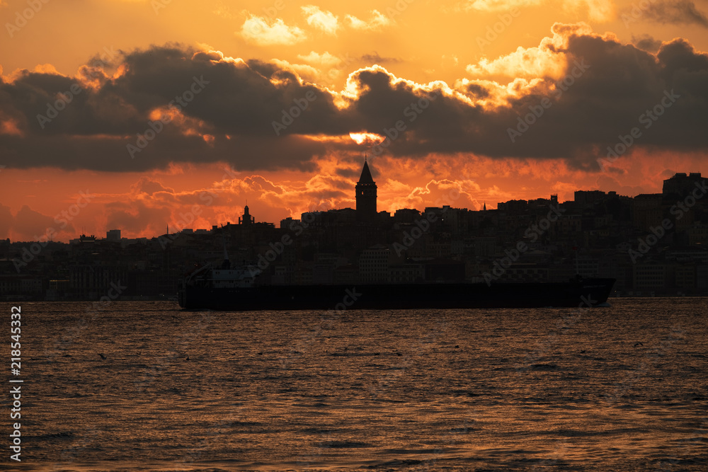 The sun sinking behind the Galata Tower