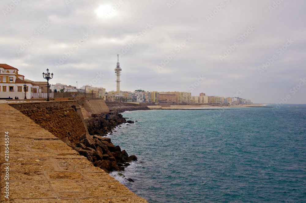 View of boulevard with sea and city, Cadiz, Spain