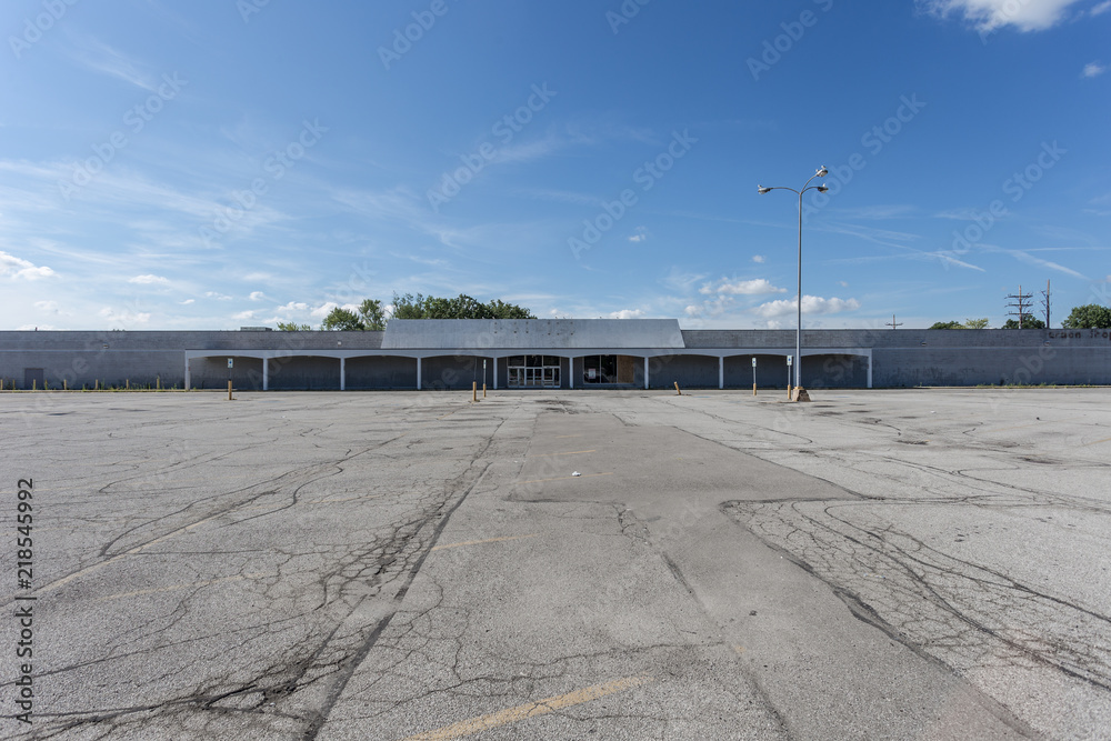Large empty storefront and empty parking lot Stock Photo Adobe Stock