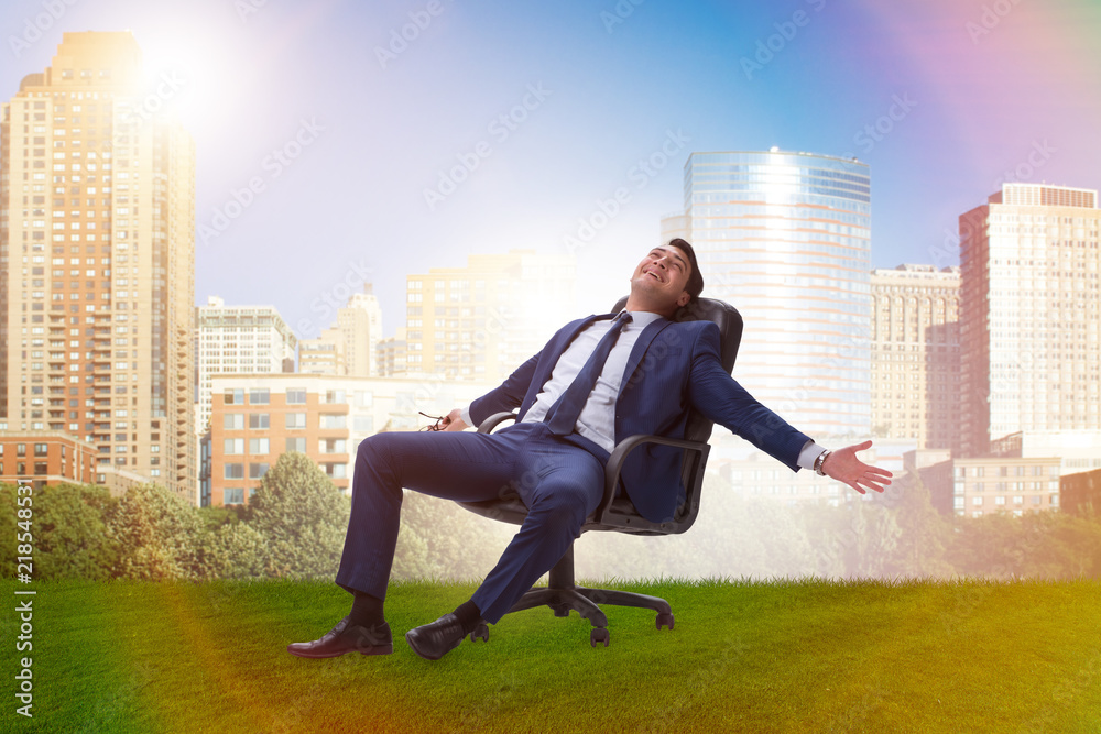 Young male businessman enjoying his time during vacation Young male businessman enjoying his time during vacation