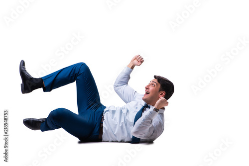 Businessman lying on the floor isolated on white