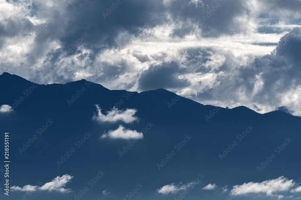 Dramatic morning mist rises over the rocky mountains in British Columbia Dramatic morning mist rises over the rocky mountains in British Columbia
