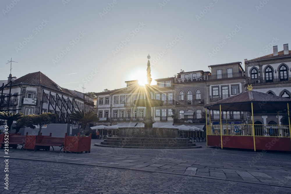 Main square of the ancient village of Portugal, Ponte de Lima. Villa with great value next to the Rio Lima. Photo taken at sunrise