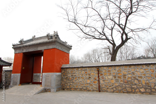 Temple gate in the Zhengjue temple in Old summer palace ruins park, Beijing, China photo