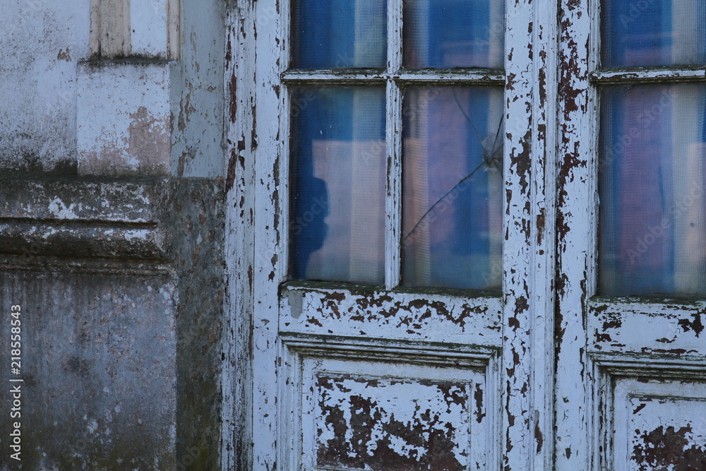 Window reclection on old door