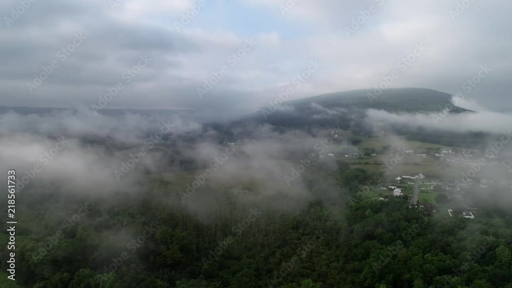 Drone flying through the mist. Close up view of low-hanging clouds Drone flying through the mist. Close up view of low-hanging clouds