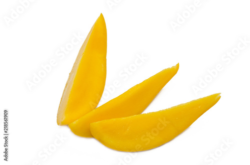 Mango cut into pieces isolated on white background.