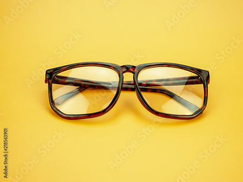 eye glasses on yellow background