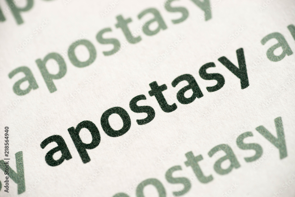 word apostasy printed on paper macro word apostasy printed on paper macro