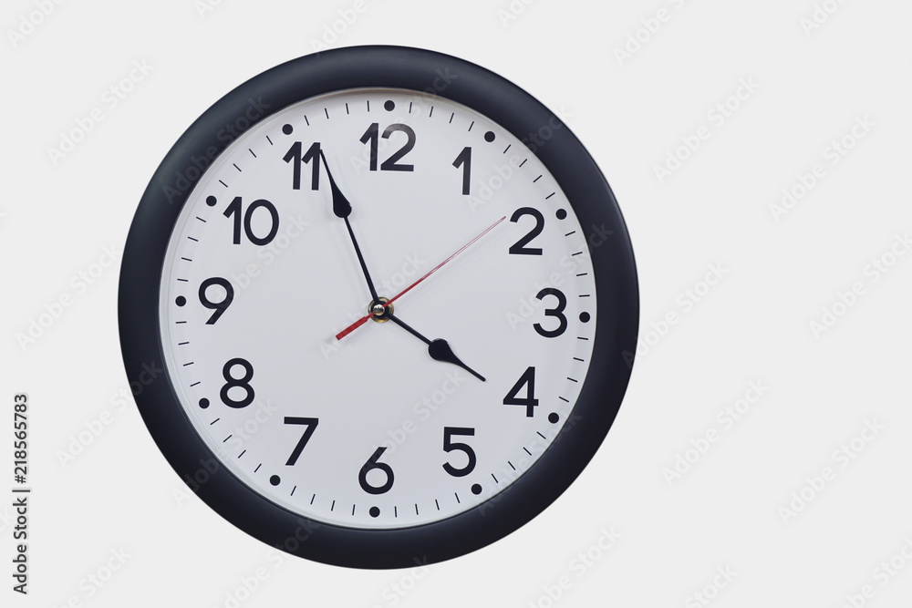 Time concept with black clock at three to four am or pm Time concept with black clock at three to four am or pm