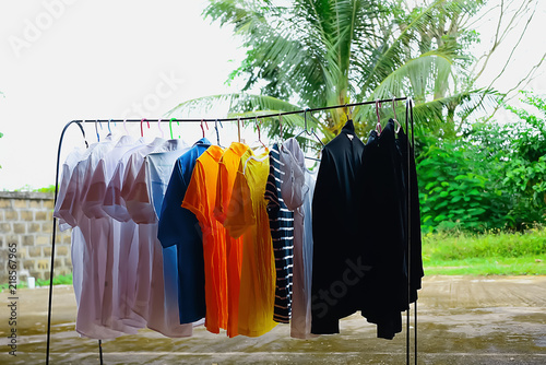 Clothes were hung on an iron railing.