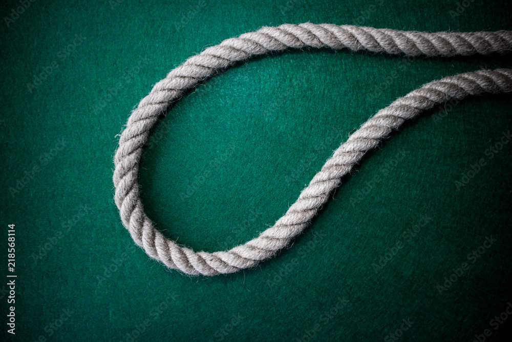 Rope on colorful green background Rope on colorful green background