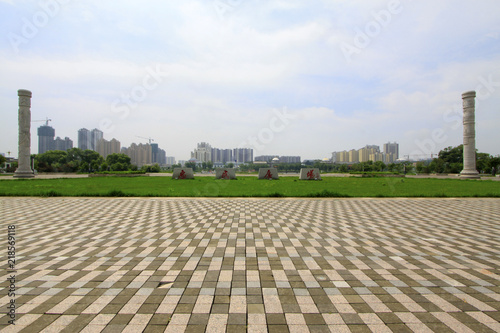lawn and buildings in a square