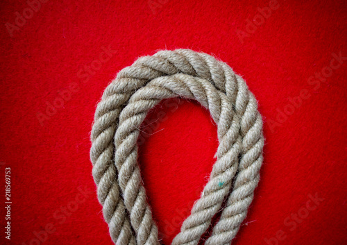 Rope on colorful red background