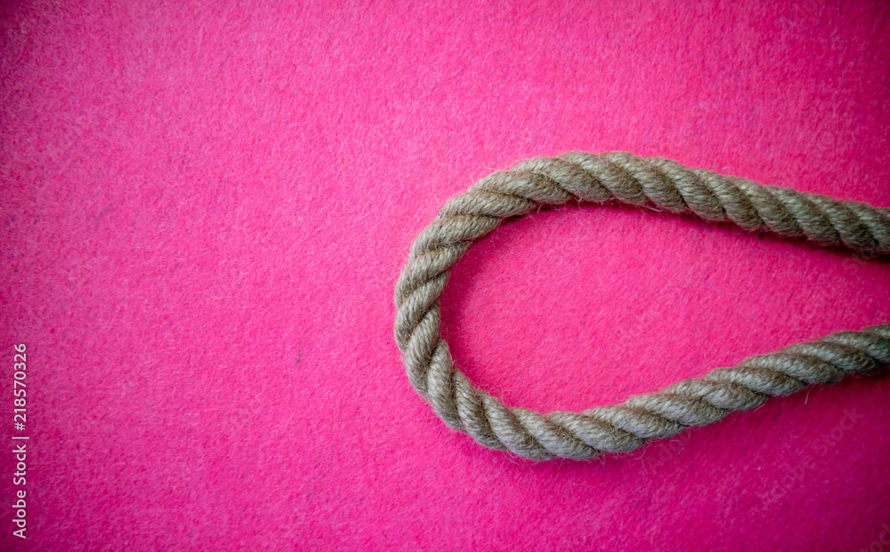 Rope on colorful pink background