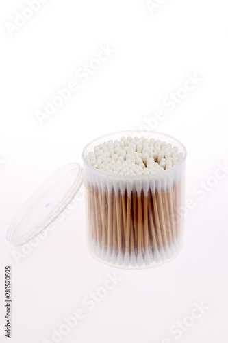 Cotton swabs in transparent plastic box