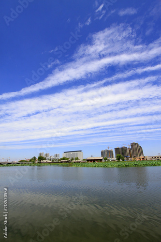 Wide water surface and buildings © junrong