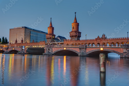 The Oberbaumbridge and the river Spree in Berlin at dusk