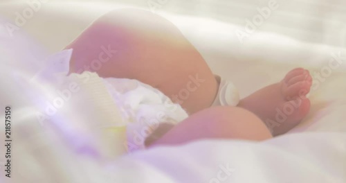 Wallpaper Mural Small baby newborn at hospital in incubator Neonatology,Cared for by a doctor neonatologist and nurse. Medical devices cardiogram cannula tube. Torontodigital.ca