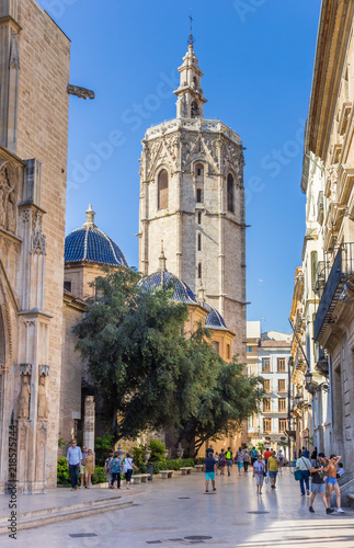 Tower and blue tiled domes of the historic cathedral in Valencia, Spain