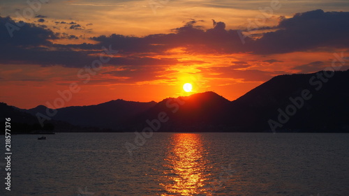 Iseo, Brescia, Italy. Amazing warm sunset at Iseo lake