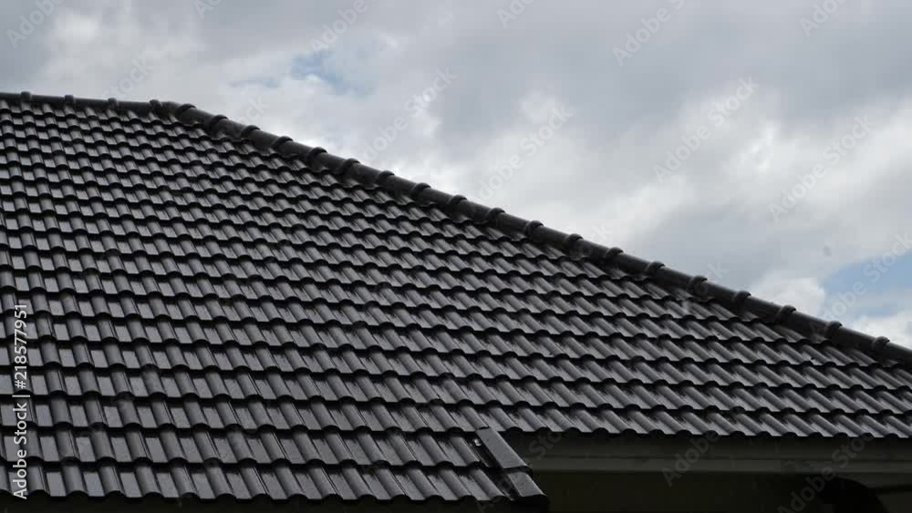 slow motion rainy day scene, water rain falling drops on roof house slow motion rainy day scene, water rain falling drops on roof house