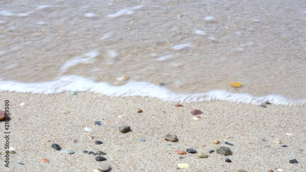 Sea or ocean waves on a golden sandy beach bank. Sea or ocean waves on a golden sandy beach bank.