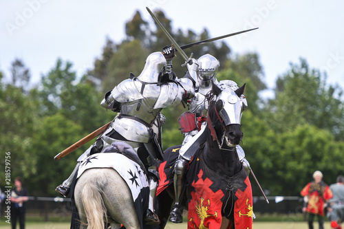 Two medieval knights confront during jousting tournament © PicMedia