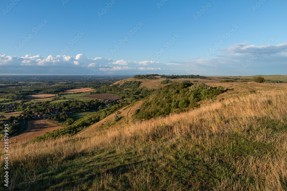 Stunning Summer sunset landscape image of South Downs National Park in English countryside