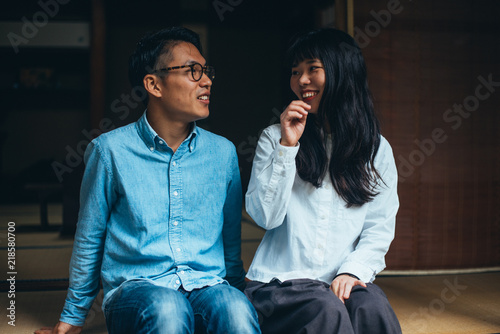 Photography Young japanese couple spending time in their house