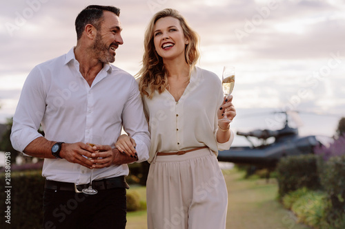 Smiling couple walking outdoors © Jacob Lund