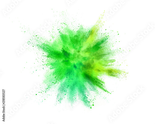 Explosion of coloured powder isolated on white background.