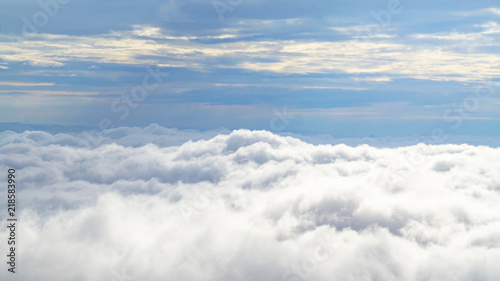 Over the Clouds. Fantastic background with clouds and mountain peaks