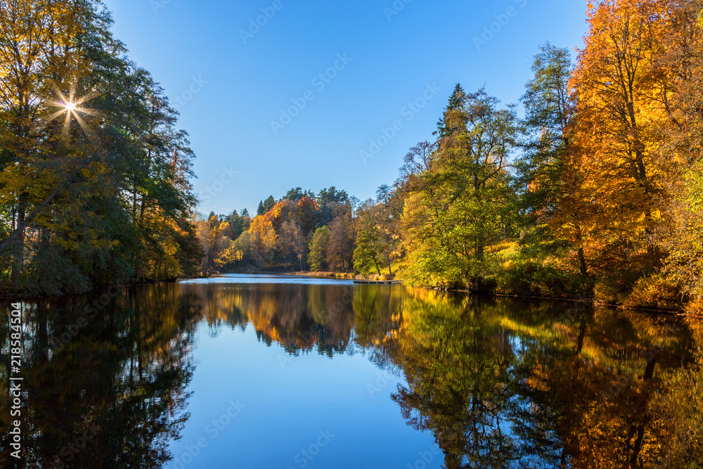 River with the sun in autumn colors