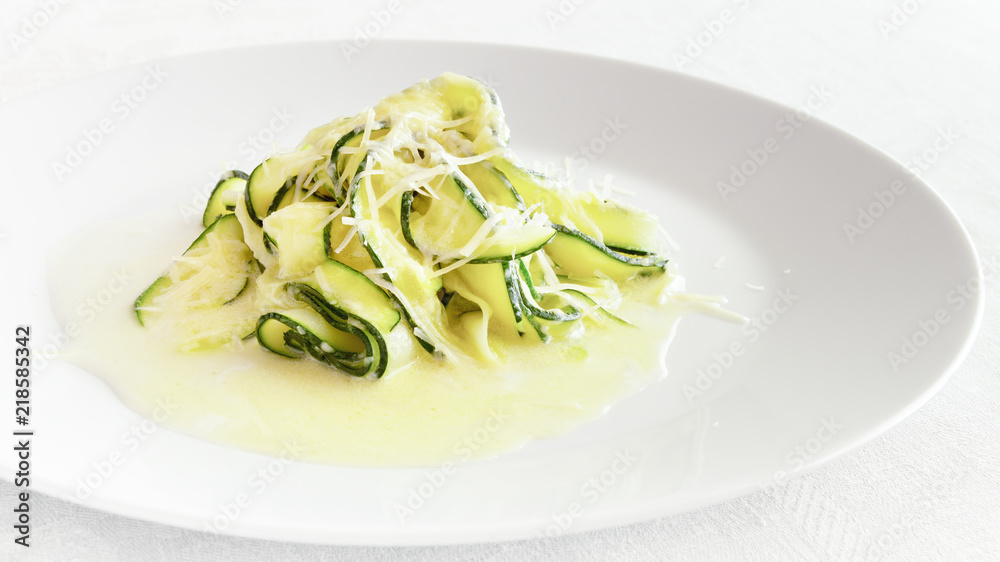 zucchini strips with creamy alfredo sauce sprinkled with parmesan zucchini strips with creamy alfredo sauce sprinkled with parmesan