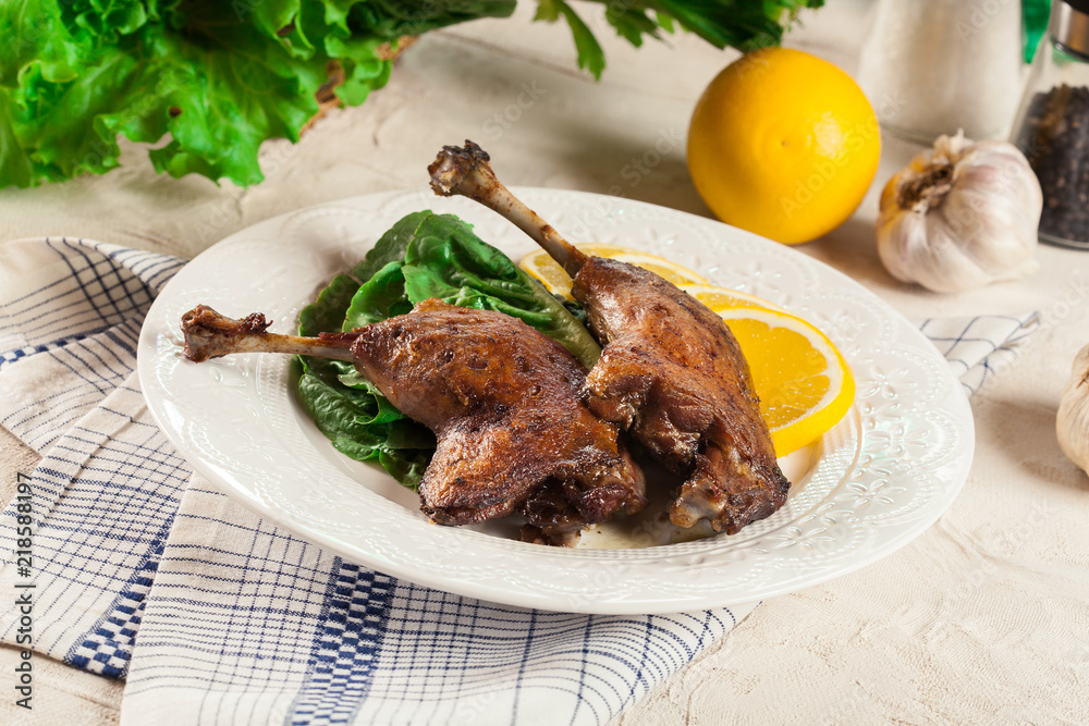Duck legs confit with orange and salad Duck legs confit with orange and salad