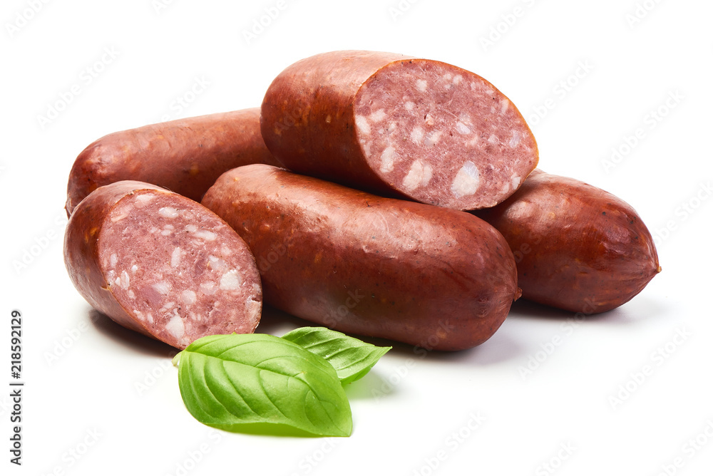 Smoked sausages with sausage slices and basil herb, isolated on white background. Smoked sausages with sausage slices and basil herb, isolated on white background.
