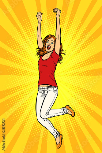 Joyful young woman jumping up