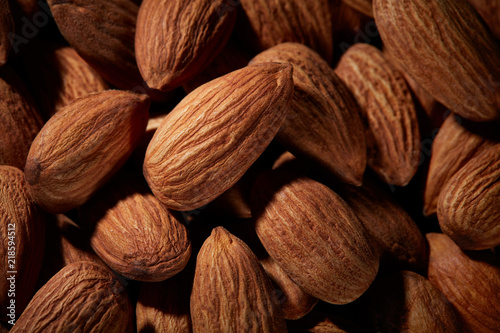 Organic texture of almonds. View from above. Almond. Almonds macro. Almonds background. Almond nuts.