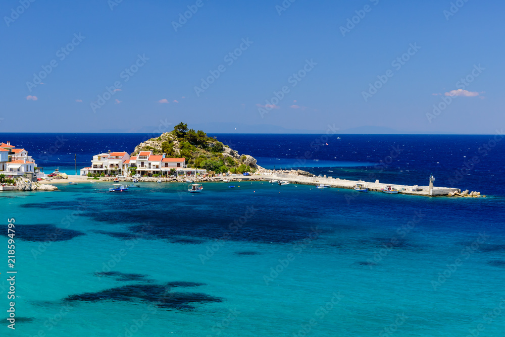 Picturesque Bay with blue water in Kokkari village, Samos island, Greece
