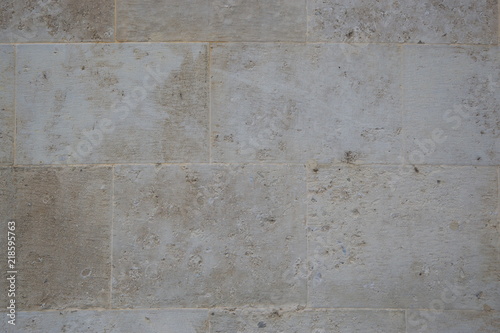 Gray wall from stone blocks close-up