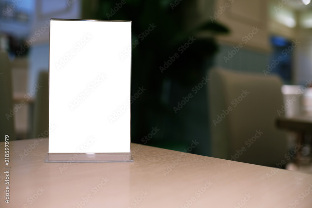 Menu frame standing on wood table in Bar restaurant cafe. space for text marketing promotion.