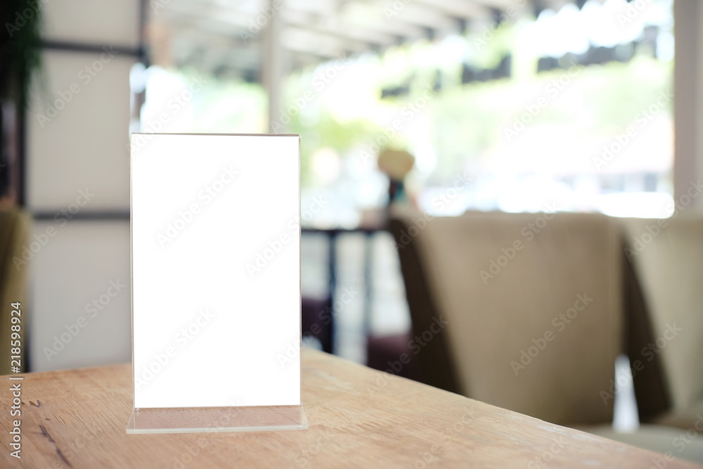 Menu frame standing on wood table in Bar restaurant cafe. space for text marketing promotion. Menu frame standing on wood table in Bar restaurant cafe. space for text marketing promotion.